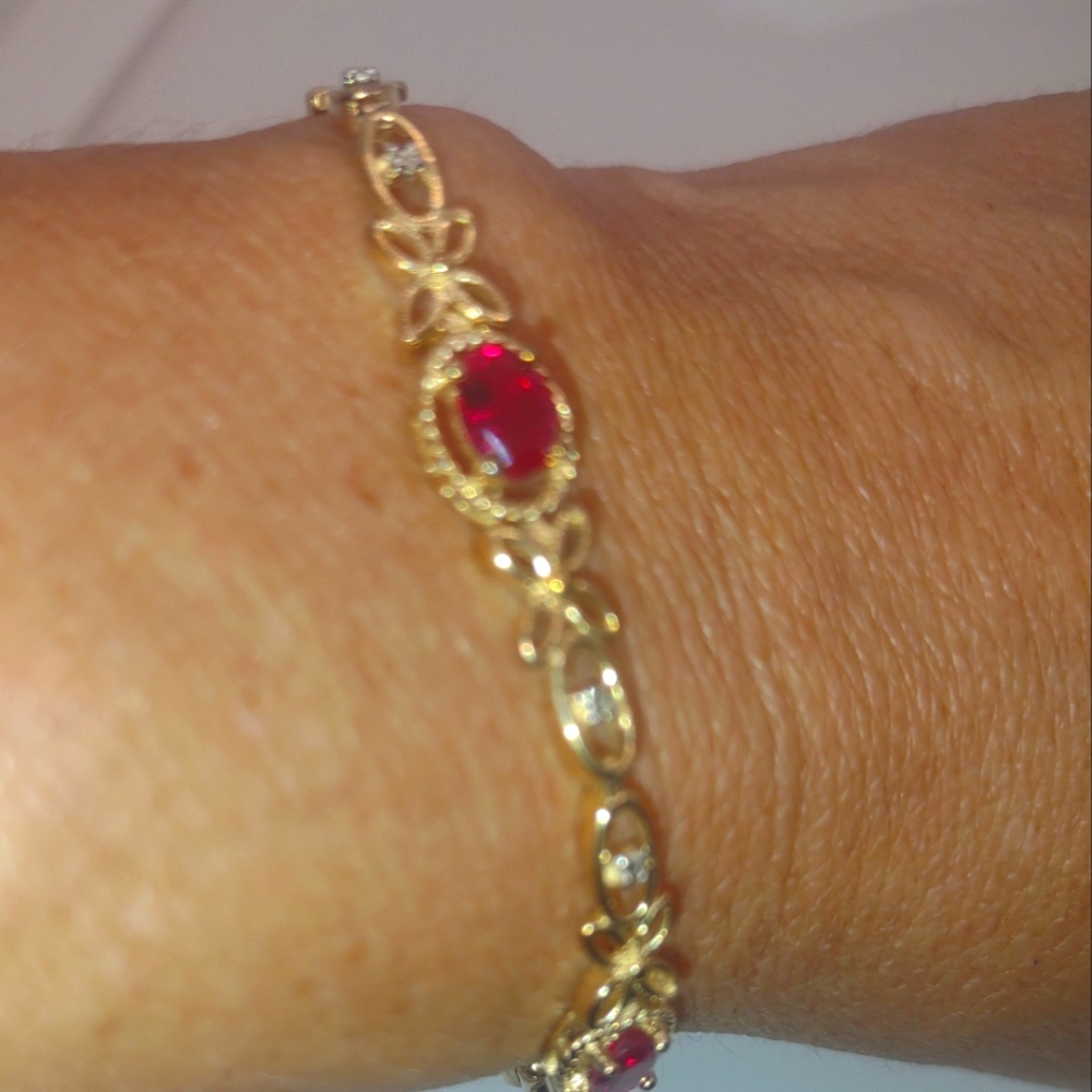 Elegant Gold and Red Gemstone Bracelet